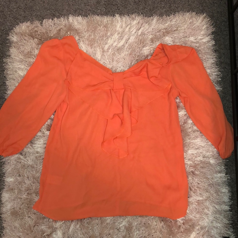 Orange flowy top